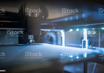 Close up shot of 3D printer printing 3D objects.