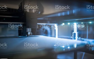 Close up shot of 3D printer printing 3D objects.